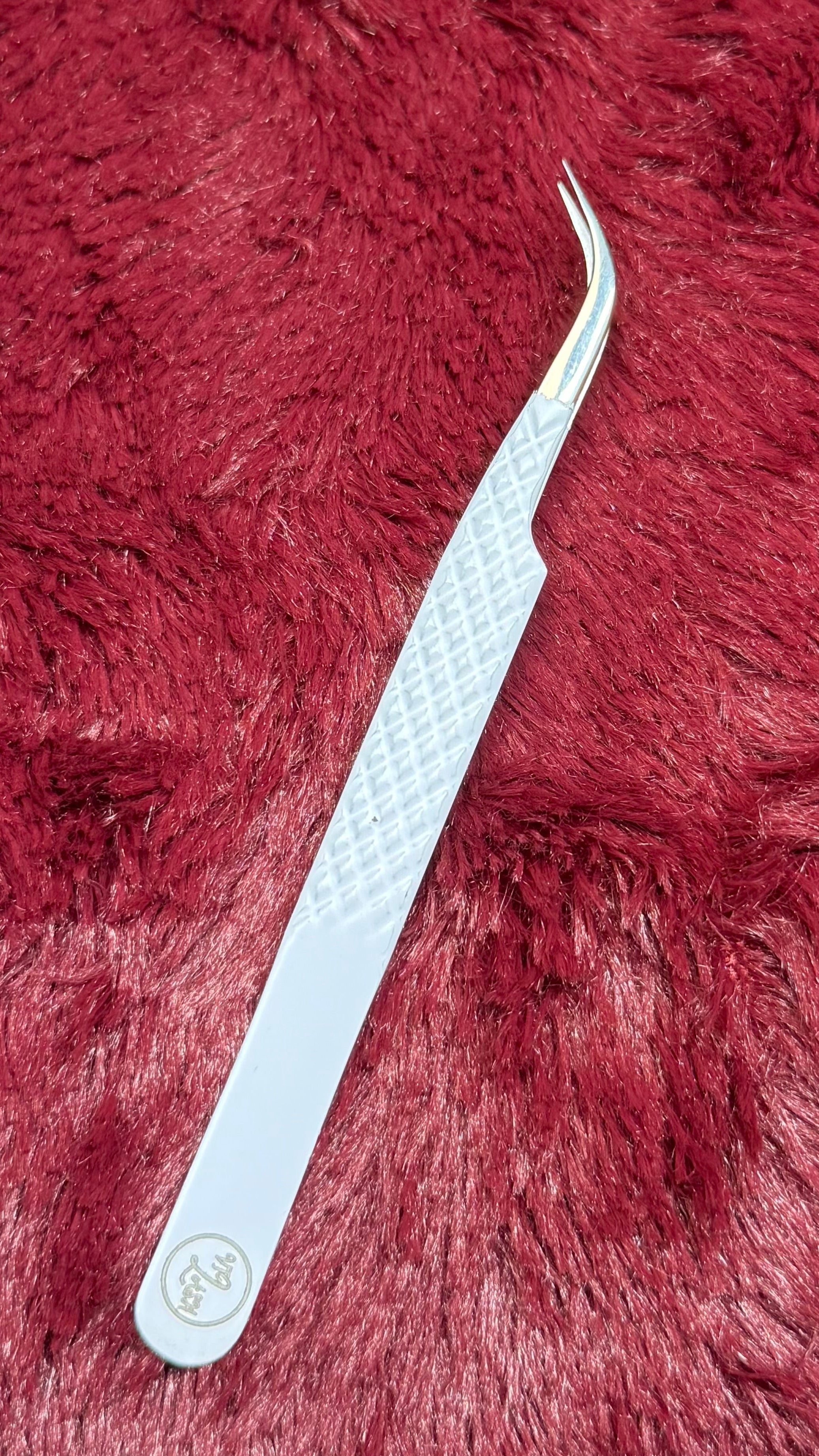 Curved Isolation Tweezer